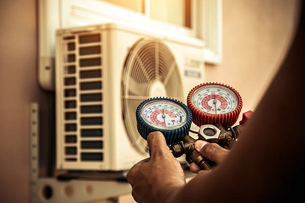 Professional Air Conditioning Service technician working in Fairview, NJ